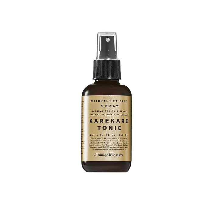 Beautiful KareKare Tonic Spray with a gold label, amber font and a tastful thickness of it.
